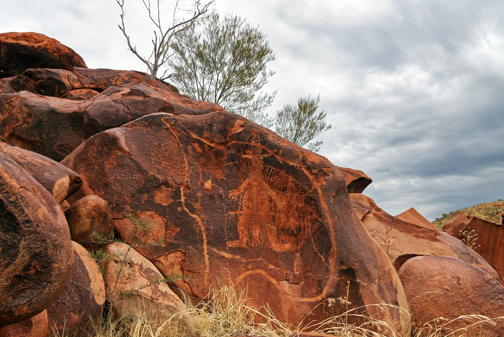Indigenous Australian rock drawing in outback Indigenous Australian rock drawing in outback